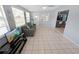 Living room features a comfortable couch and access to the kitchen at 543 Silver Crse, Ocala, FL 34472