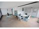 Enclosed patio space includes a seating area, storage, and access to the yard at 543 Silver Crse, Ocala, FL 34472