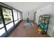 Enclosed patio space includes an exterior view, and access to storage at 543 Silver Crse, Ocala, FL 34472