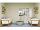 Relaxing patio with comfortable seating, stylish decor, and access to a modern kitchen at 5689 Meditation Dr, Clermont, FL 34714