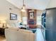 Inviting living room featuring a brick fireplace, and an entertainment center at 700 Wyckliffe Pl, Winter Springs, FL 32708