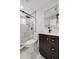 Bathroom featuring a walk-in shower and a vanity with lots of storage at 709 Suzette Dr, Ocoee, FL 34761
