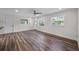 Spacious room features wood floors, neutral walls, and modern lighting at 709 Suzette Dr, Ocoee, FL 34761