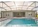 Relaxing pool area with an outdoor dining space perfect for entertaining at 730 Rominger Loop, Apopka, FL 32712
