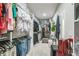 Extensive walk-in closet with shelving and storage for clothes and shoes at 730 Rominger Loop, Apopka, FL 32712