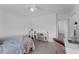 A bedroom featuring a single bed and built-in shelving at 7344 Swallow Run # 7344, Winter Park, FL 32792