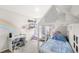 Bright bedroom with whimsical decor, work station, and house frame bed at 7603 Taormina Way, Clermont, FL 34714