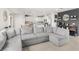 Comfortable living room featuring a large sectional sofa and stylish decor at 7603 Taormina Way, Clermont, FL 34714