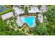 Stunning aerial view of a community pool, mini golf, clubhouse, playground and other amenities at 812 Benoi Dr, Davenport, FL 33896