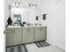 Modern bathroom featuring double vanity and tile flooring at 812 Benoi Dr, Davenport, FL 33896