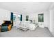 Bright bedroom with plush carpet and plenty of natural light at 812 Benoi Dr, Davenport, FL 33896
