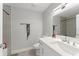 Clean and simple bathroom featuring a white vanity, toilet, and a shower with modern fixtures at 945 Shawna Shrs, Haines City, FL 33844