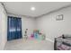 A room decorated with string lights and a crib at 945 Shawna Shrs, Haines City, FL 33844