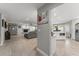 Spacious open-concept layout features a fireplace, tile flooring, and views into the kitchen and dining areas at 945 Shawna Shrs, Haines City, FL 33844