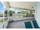 Bright sunroom with screen enclosure offering views of the surrounding trees and fenced backyard at 945 Shawna Shrs, Haines City, FL 33844