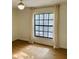 Bright bedroom with hardwood floors and neutral walls at 1055 Kensington Park Dr # 205, Altamonte Springs, FL 32714