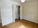 Bright bedroom with hardwood floors and ample storage space in the built-in closet at 1055 Kensington Park Dr # 205, Altamonte Springs, FL 32714