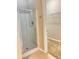 Modern bathroom with glass-enclosed shower and walk-in closet at 109 Belgian Way, Sanford, FL 32773