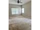 Spacious bedroom featuring neutral carpet, natural light, and high ceilings at 109 Belgian Way, Sanford, FL 32773