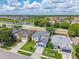 A beautiful aerial view showcases the property's prime location, with nearby ponds and well-maintained landscaping at 1224 Blackwater Pond Dr, Orlando, FL 32828