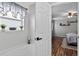 A bathroom with a luxurious garden tub beneath a window and stylish decor at 1224 Blackwater Pond Dr, Orlando, FL 32828