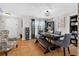 Charming dining room featuring tile floors, stylish lighting, and a wooden table with bench seating at 1224 Blackwater Pond Dr, Orlando, FL 32828