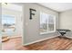 Bright and airy living room with large windows and neutral paint colors at 1224 Blackwater Pond Dr, Orlando, FL 32828
