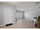 Bright foyer with tiled flooring leading into a spacious living area, adjacent to a window-lit room at 1292 Cavender Creek Rd, Minneola, FL 34715