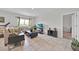 Comfortable living room with tile flooring, modern furniture, and ample natural light at 145 Piave St, Haines City, FL 33844