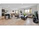 Spacious living area with tile floors connecting to the kitchen and dining space at 145 Piave St, Haines City, FL 33844