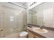 Full bathroom featuring a shower/tub combo, vanity and large mirror at 1456 Sun Meadow Dr, Orlando, FL 32824