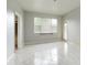 This bedroom is bright and airy with large windows and a separate door to the exterior at 1456 Sun Meadow Dr, Orlando, FL 32824