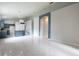 Open-concept living space with arched doorway, tile floors, and lots of natural light at 1456 Sun Meadow Dr, Orlando, FL 32824