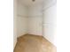 Walk-in closet with carpeted floor and built-in wire shelving for optimal storage at 1456 Sun Meadow Dr, Orlando, FL 32824