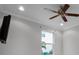 Bedroom featuring a ceiling fan and a view from the window at 15900 Citrus Knoll Dr, Winter Garden, FL 34787
