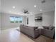 Living room featuring a ceiling fan, recessed lighting, and a large sectional sofa at 15900 Citrus Knoll Dr, Winter Garden, FL 34787