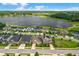 Aerial view of lakeside homes, showcasing the neighborhood's proximity to the water and community layout at 1593 Osprey View Dr, Apopka, FL 32703