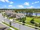 Aerial view showcasing a neighborhood and a pond nearby at 17996 Adrift Rd, Winter Garden, FL 34787
