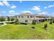 A spacious lawn and well-manicured landscaping are highlights at 17996 Adrift Rd, Winter Garden, FL 34787