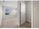 Bright bedroom with a window and neutral carpet at 17996 Adrift Rd, Winter Garden, FL 34787