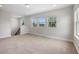 Open bonus room area with multiple windows for ample natural light at 17996 Adrift Rd, Winter Garden, FL 34787