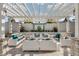 Outdoor lounge area with stylish seating, a pergola, and decorative elements for a relaxing ambiance at 17996 Adrift Rd, Winter Garden, FL 34787