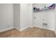 Laundry room with tile flooring and shelving at 17996 Adrift Rd, Winter Garden, FL 34787