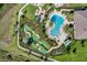 Aerial view of a community with a resort-style pool and a fun mini-golf course, perfect for Gathering entertainment at 17996 Adrift Rd, Winter Garden, FL 34787
