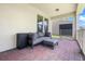 Covered patio with red brick flooring and outdoor seating area at 17996 Adrift Rd, Winter Garden, FL 34787