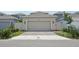 Two-car garage with paved driveway at 2345 Volunteer Ave, Kissimmee, FL 34744
