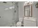 The updated bathroom boasts a stylish glass shower and modern fixtures for a spa-like experience at 2508 Seven Oaks Dr, St Cloud, FL 34772