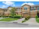 Attractive townhomes feature attached garages, neutral exteriors, landscaping and individual driveways at 2508 Seven Oaks Dr, St Cloud, FL 34772