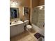 Compact bathroom design showcasing tiled floors, a shower, and ample storage at 2536 Lancien Ct # 5, Orlando, FL 32826
