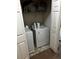 Laundry room highlighting stacked washer and dryer for efficient space-saving at 2536 Lancien Ct # 5, Orlando, FL 32826